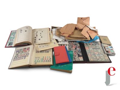 a pile of books and papers on a white surface