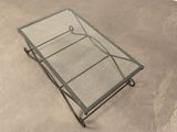 rectangular glass coffee table with metal frame and glass top