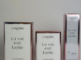 three bottles of lancome la vie teste and a box of lancome la vie teste