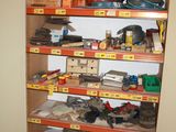 a closet full of assorted items in a garage