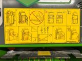 a sign on the back of a tractor that says no parking