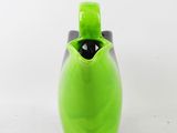 a green vase with a black lid on a white background