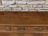 an old wooden dresser with drawers and drawers on top of it