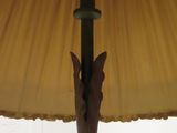 a lamp that is sitting on a table in a room