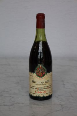 a bottle of wine that is sitting on a table