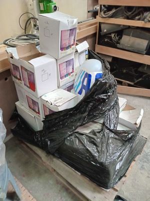 a pile of boxes sitting on top of each other in a room