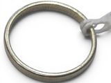 an image of a metal ring on a white background