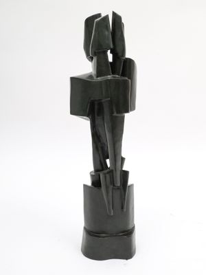 statue of a man holding a woman ' s hand on a pedestal