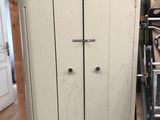 an image of a room with a ladder and a cabinet