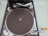 a record player that is sitting on a table