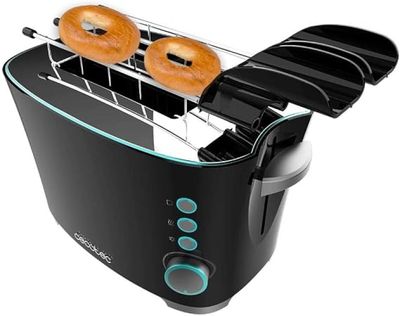 an image of a toaster with two donuts on top of it