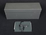 a black box with a silver tie and a black box with a silver tie