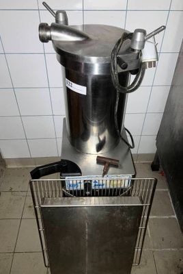 a metal container with a magazine holder on the side of it