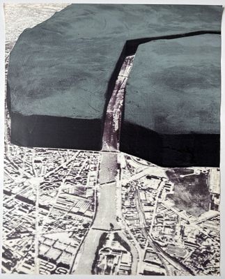 an aerial view of a city with a river in the middle of it