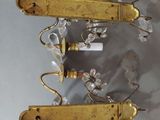 pair of antique brass wall sconces with clear glass flowers