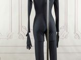 mannequin in front of a white wall in a room