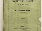 an open book with a green cover and a black border