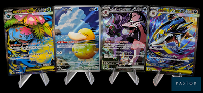 quatre types différents de cartes Pokémon exposées les unes à côté des autres
