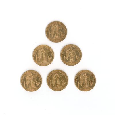 six pièces d'or sur lesquelles figurent l'effigie d'un homme et d'une femme