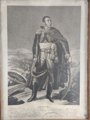 an old picture of a man in military clothing standing in front of a mountain