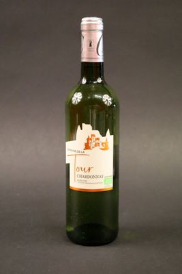 a bottle of wine that is sitting on a table