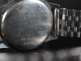 a close up view of a watch on a table