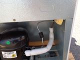 a water heater that is sitting on a pallet