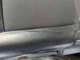 a close up of a car seat with a cup holder