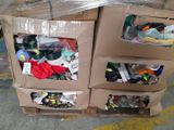 a cardboard box filled with assorted items on the floor