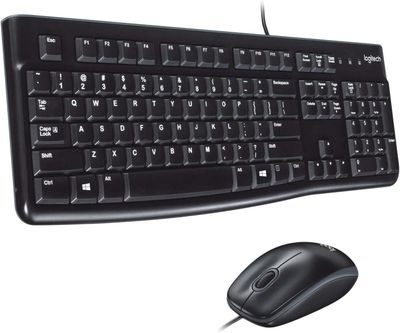 a computer keyboard and mouse sitting next to each other