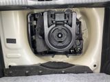a picture of the inside of a car with the door open