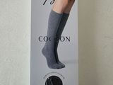 packaging of a pair of knee high socks on a white surface