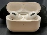 a pair of airpods sitting in a case on a table