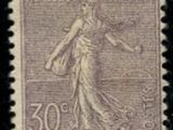 a stamp with an image of a woman on it