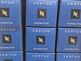 several blue boxes of vertuo vertuo and diavoolito