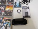 many video games on the table and a game controller