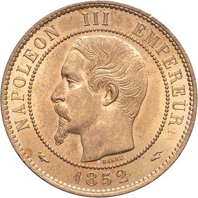a close up of a coin with a man ' s face on it