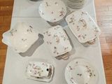 a table with a lot of plates and bowls on it