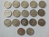 a lot of coins that are on the table