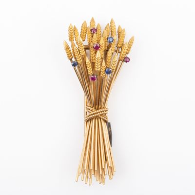 an image of a bunch of stalks of wheat on a white surface