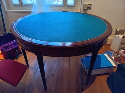 a table with a blue cloth on it in a room