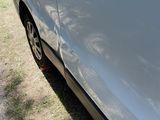 a white van parked on the side of the road