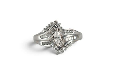a close up of a diamond ring on a white background