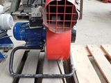 a machine that is sitting on a pallet in a warehouse