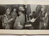 a book with a picture of a group of men in military uniforms