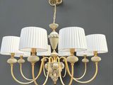 an image of a chandelier with five lamps and a lamp shade