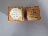 a small box with a label on it and a small box with a label on it