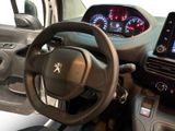 steering wheel and dashboard of a car with a digital display