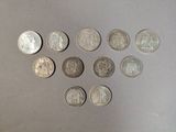 a lot of coins that are sitting on a table