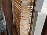 a stack of wooden crates sitting in front of a window